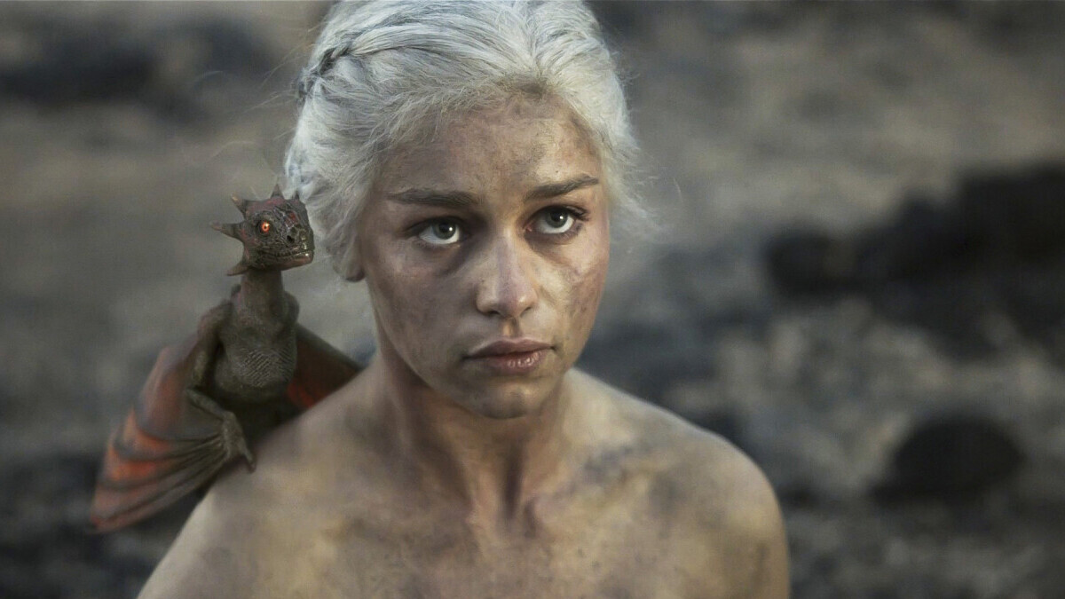 Drogon sitting on Daenerys' shoulder